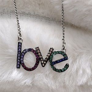 “LOVE” colorful 16 inch adjustable necklace. Lobster claw clasp. Silver tone.